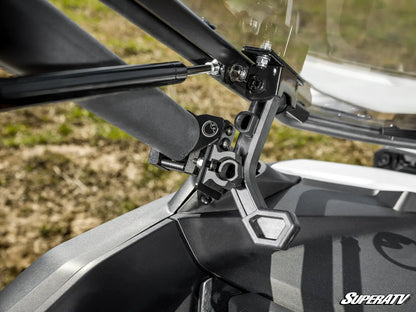 Close-up of a motorcycle handlebar with SuperATV branding.