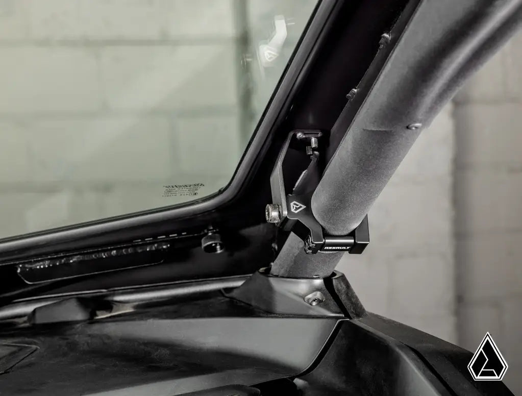 Close-up of a vehicle roof rack system on a car with a blurred background