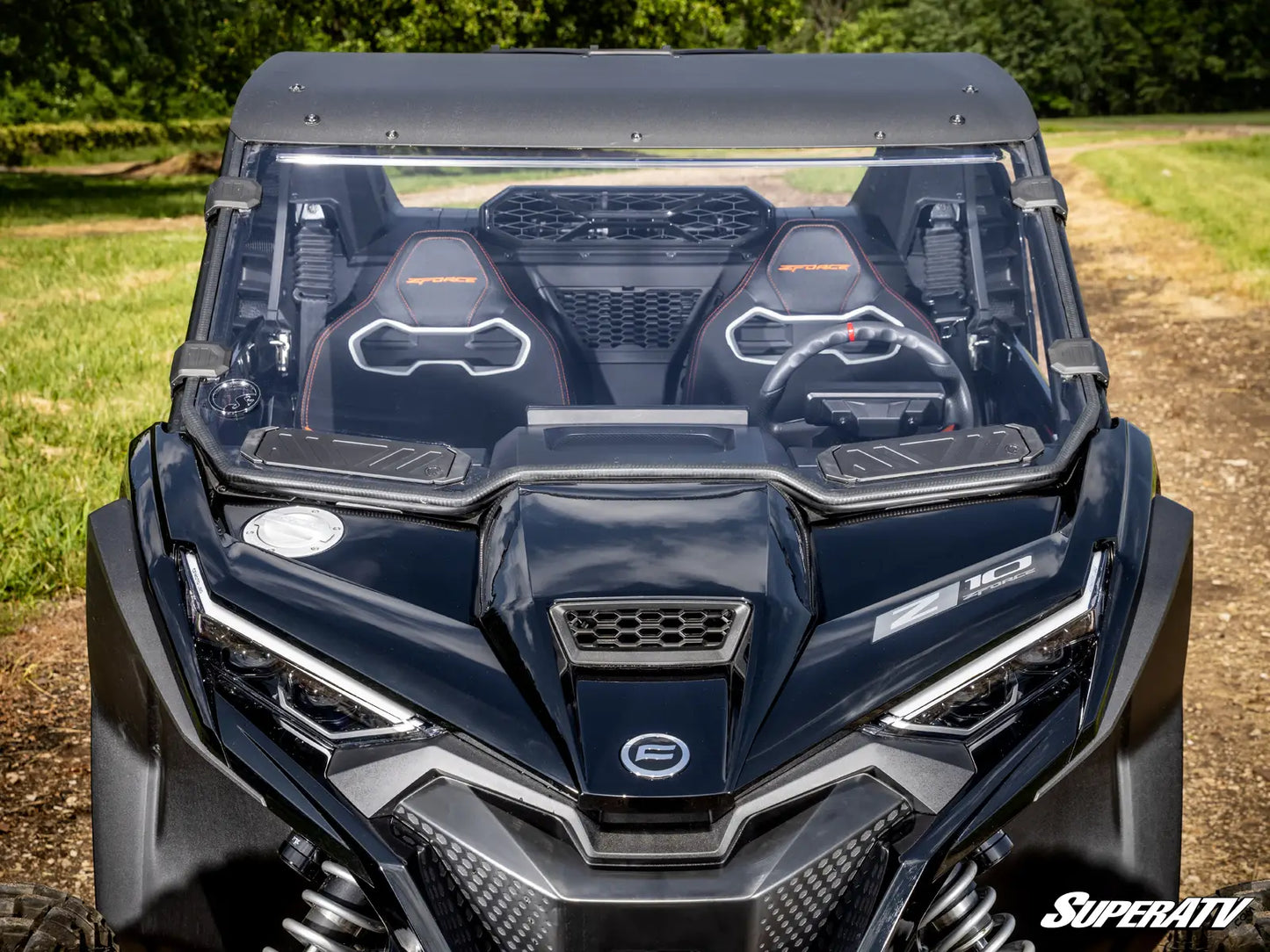 Front view of a SuperATV vehicle in an outdoor setting
