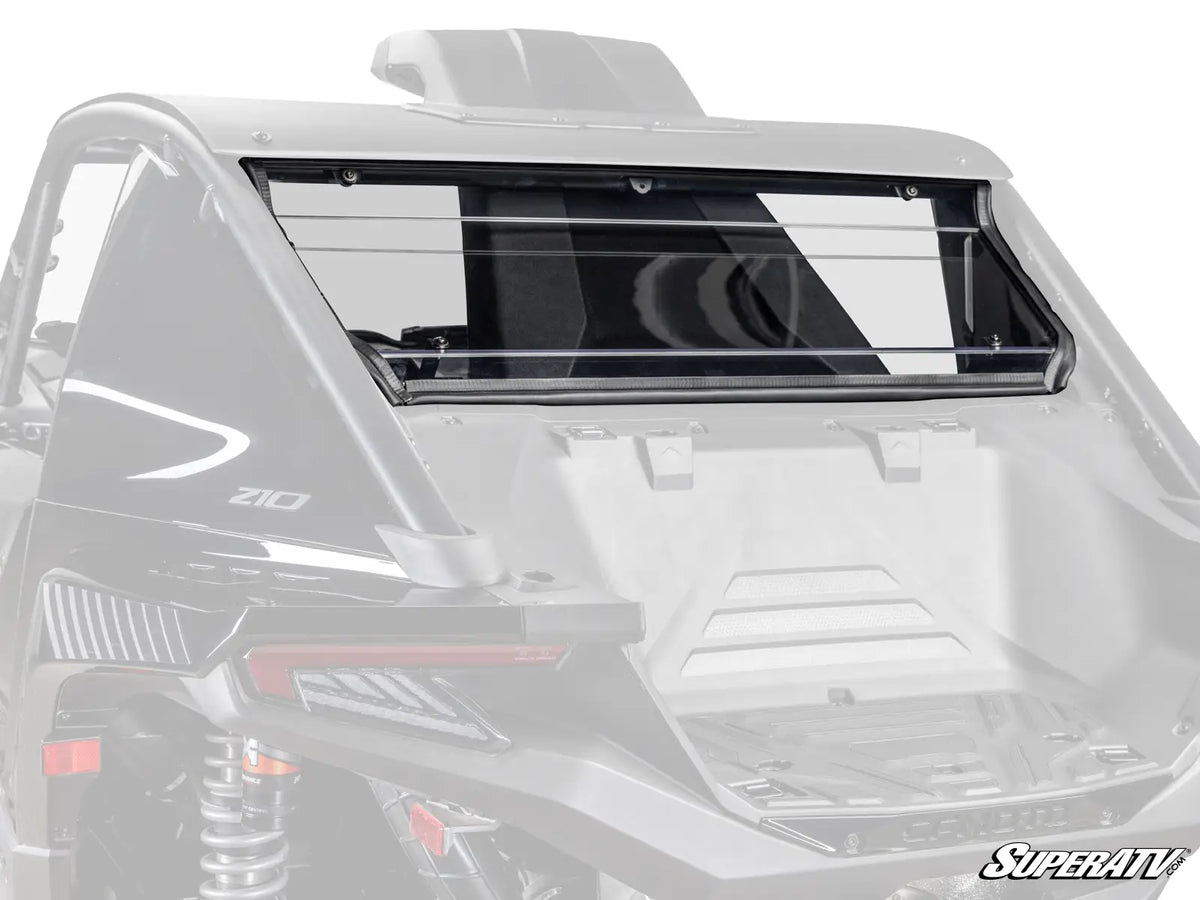 A close-up of a white off-road vehicle showing the rear cargo bed area and a black roll bar installed behind the rear window. The vehicle has a visible '210' marking on the side panel, and a 'SUPER ATV' logo watermark appears in the bottom right corner.