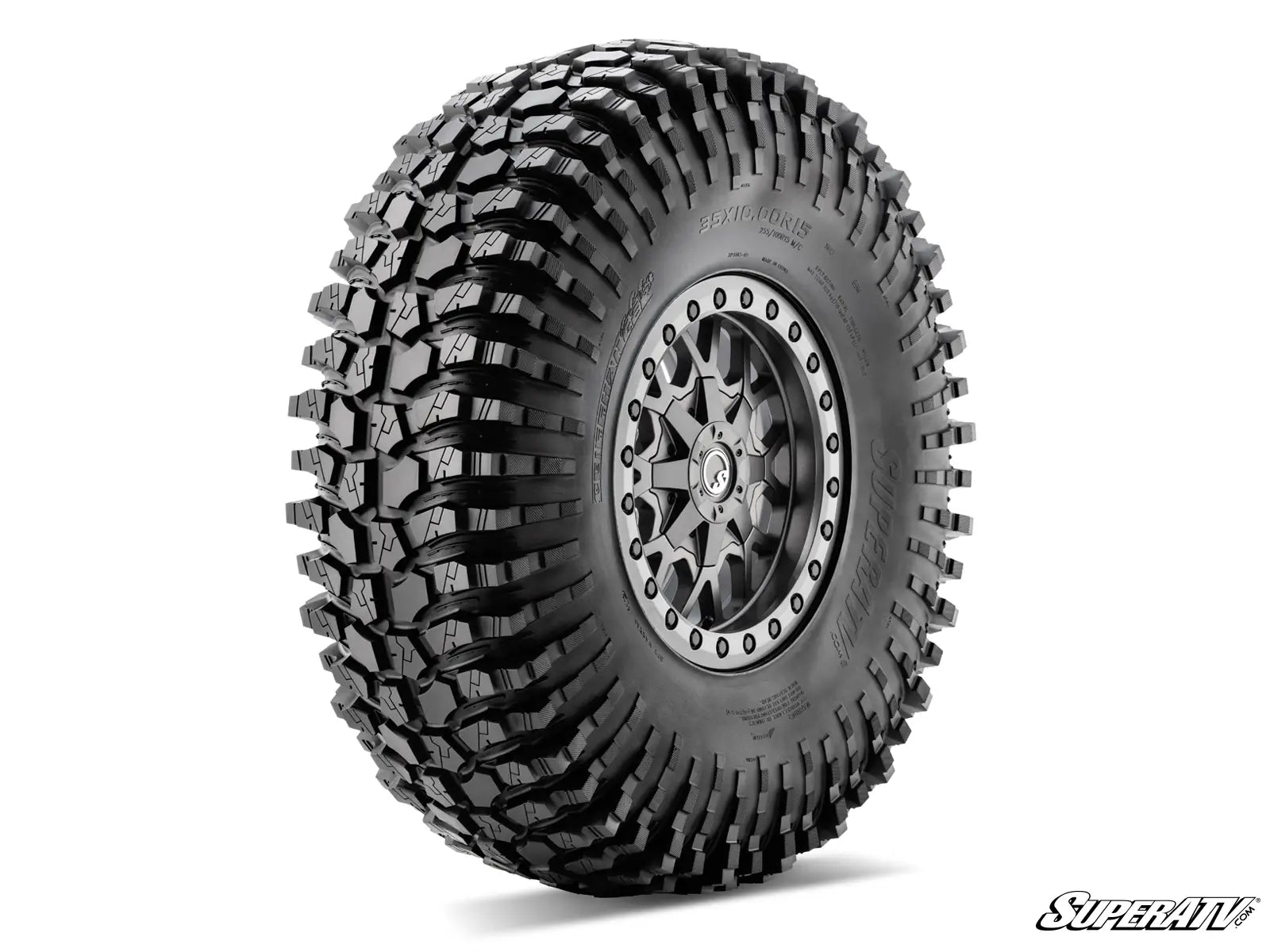 Off-road tire with detailed tread pattern on a white background, featuring the SuperATV logo.