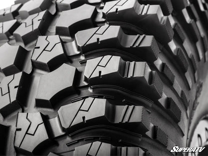 Close-up of a tire tread pattern with 'SuperATV' branding.