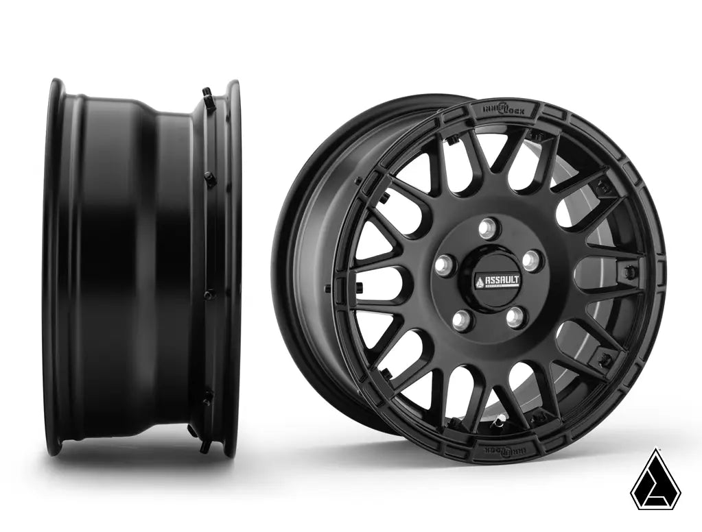 Black alloy wheel on a white background