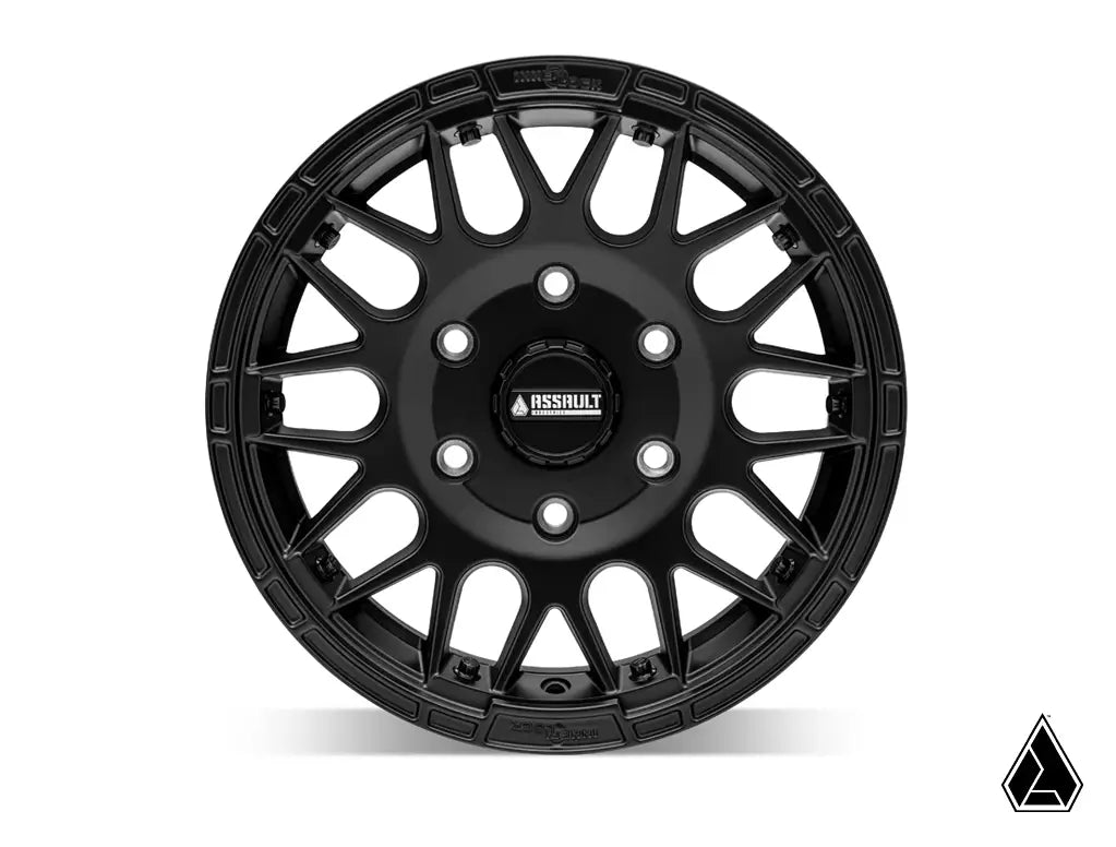 Black alloy wheel with 'Assault' branding on a white background
