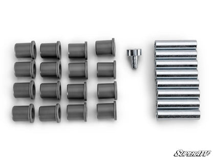 Set of gray rubber bushings and a metal filter on a white background with 'SuperATV' branding.
