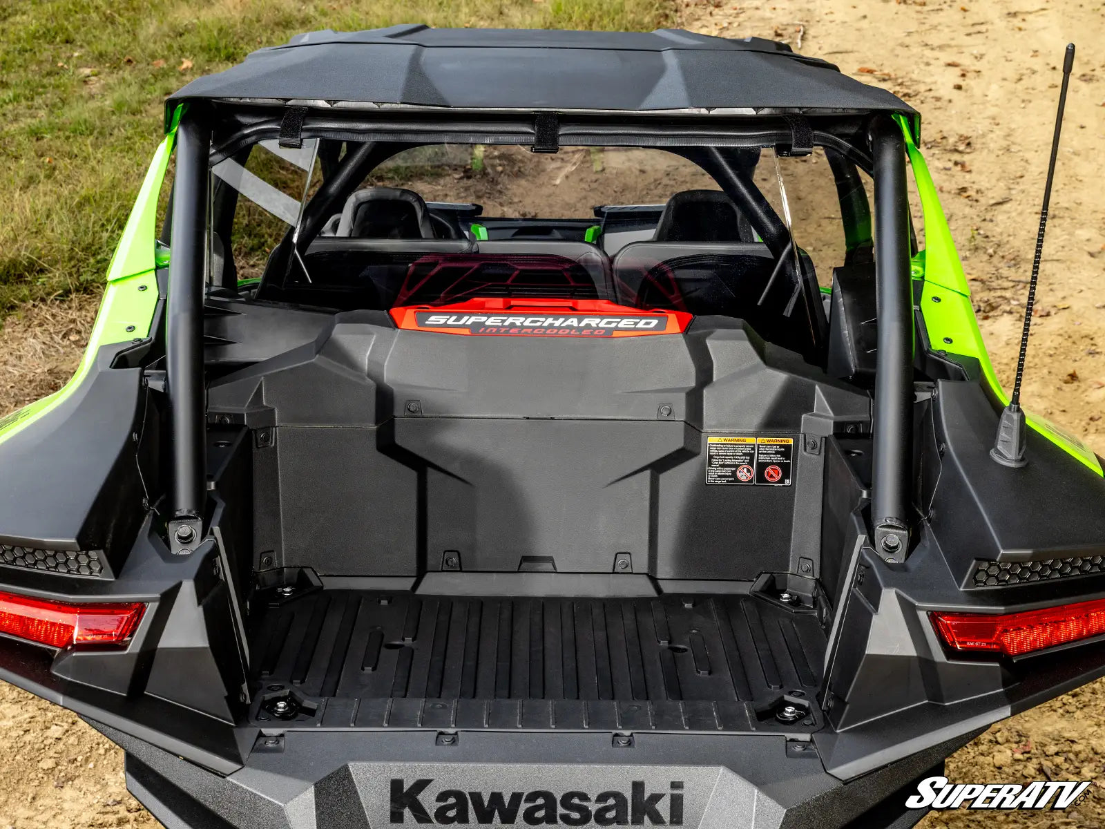 Back view of a Kawasaki SuperATV vehicle with open cargo area.