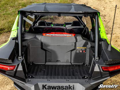 Back view of a Kawasaki SuperATV vehicle with open cargo area.