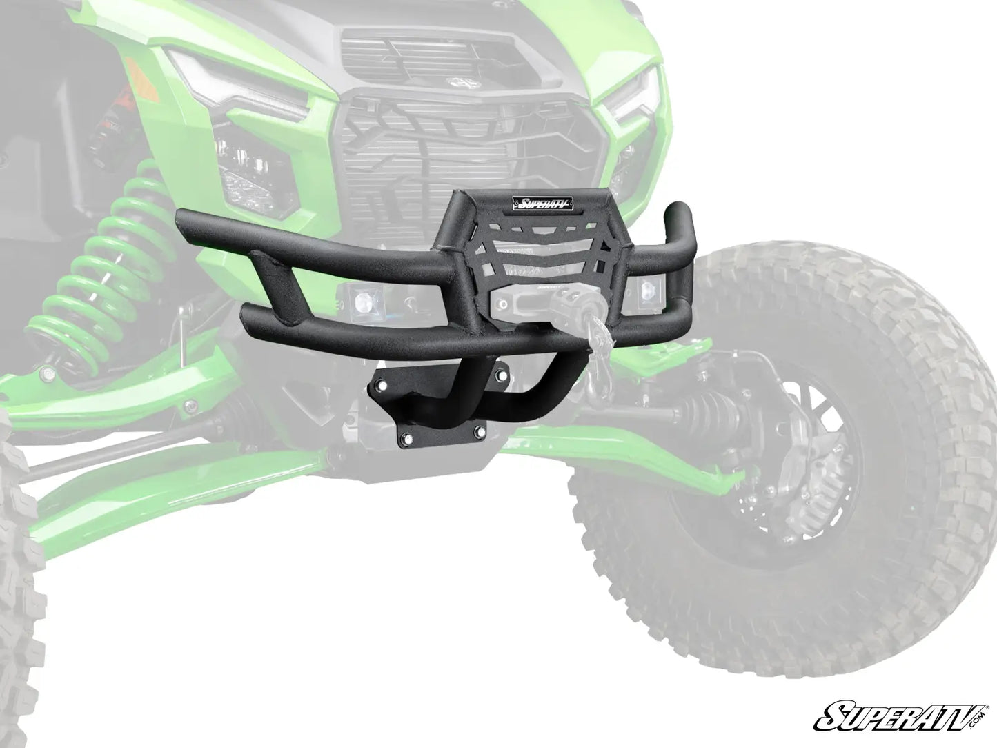 A black metal front bumper guard with integrated winch mount and mounting brackets, shown overlaid on a faded green off-road vehicle. The brand name 'Superatv' is visible on the top center plate of the bumper guard.