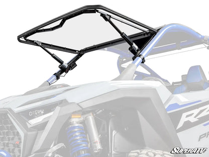 Rearview of a Polaris RZR with a black roof rack on a white background