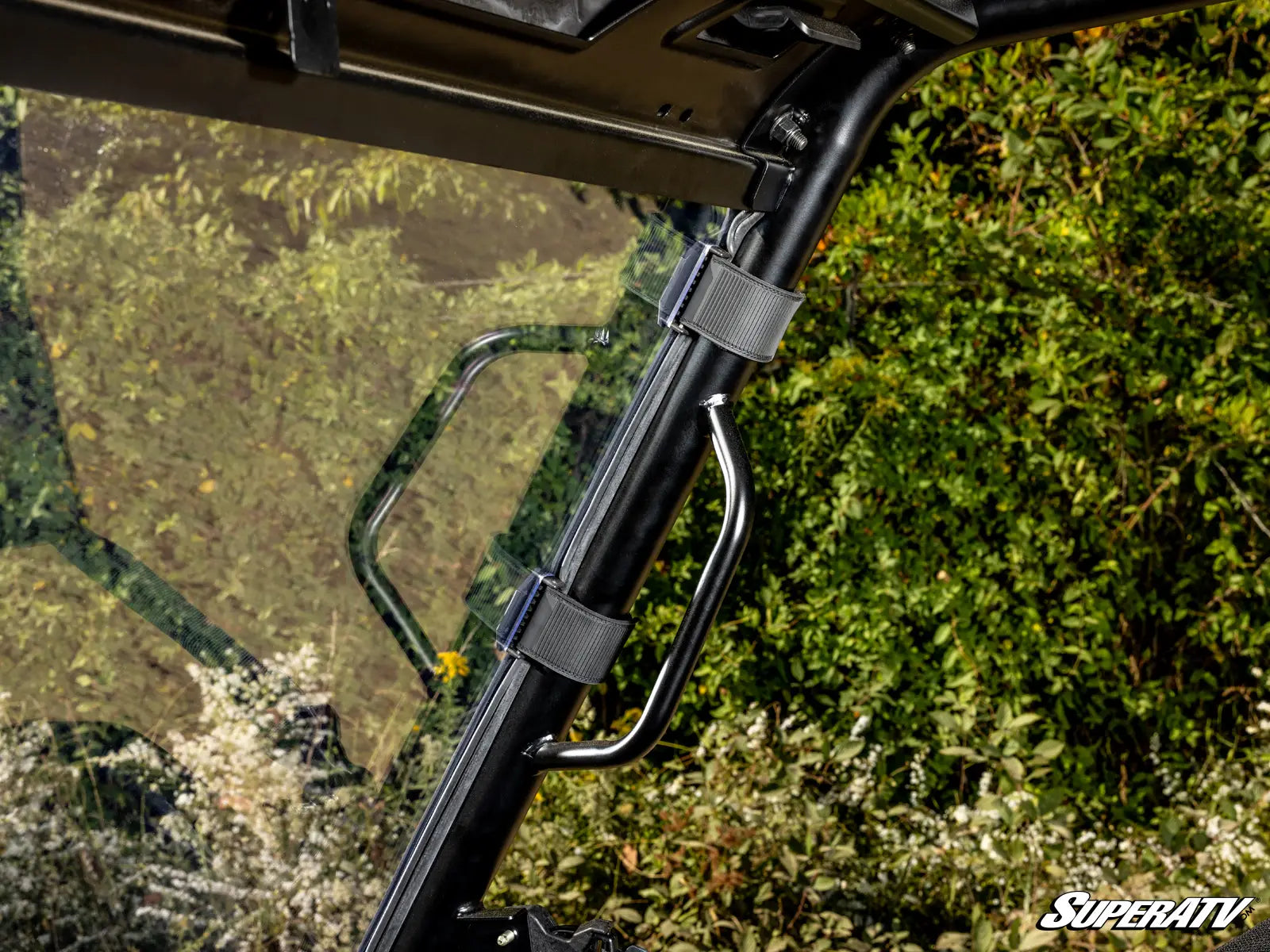Close-up of a SuperATV product with a natural outdoor background