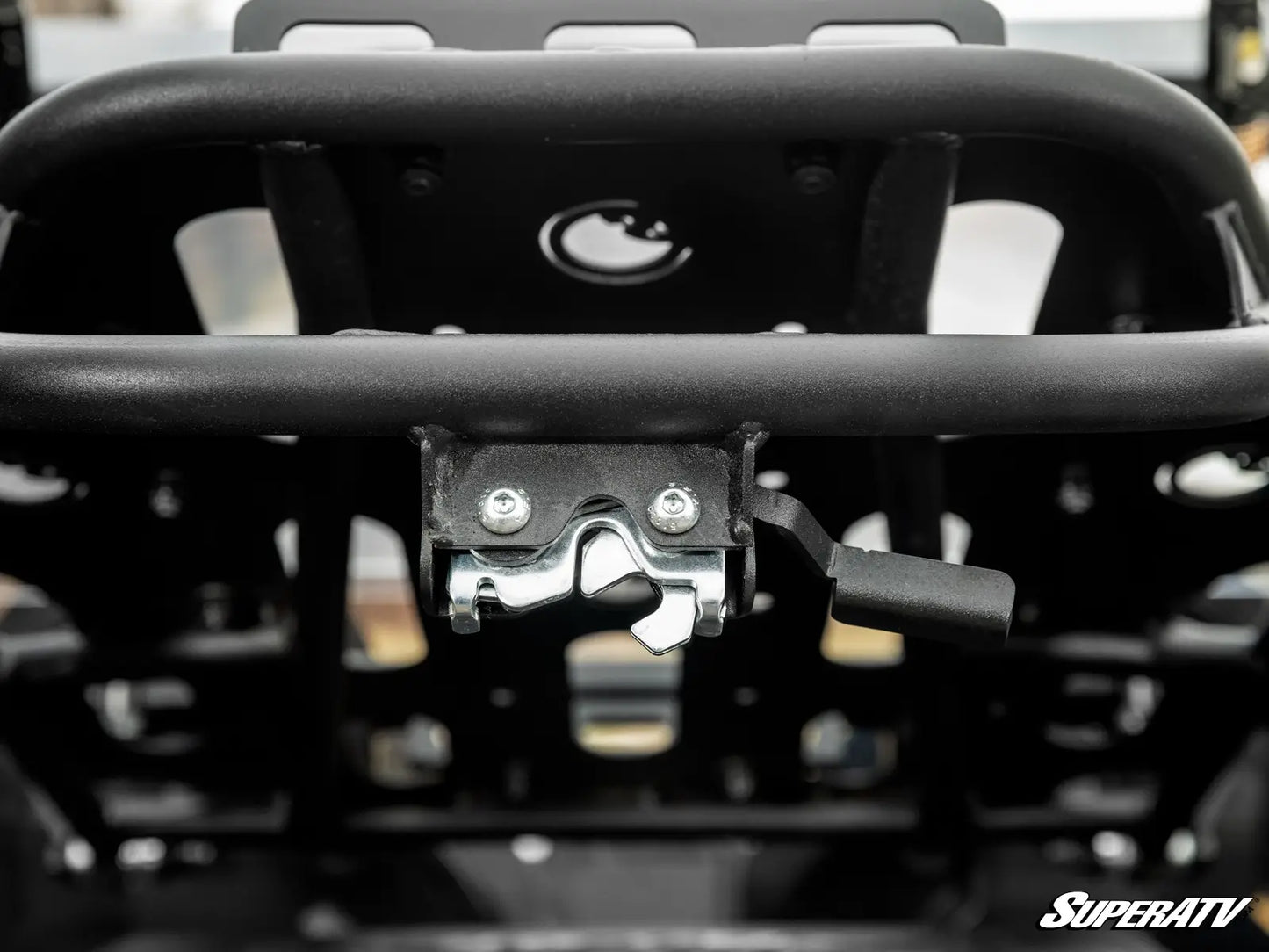Close-up of a black metal rack on a vehicle with 'SuperATV' branding.