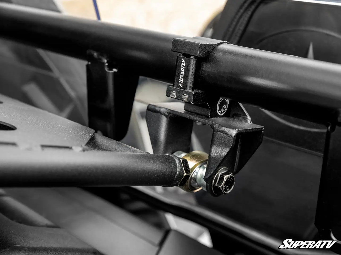 Close-up of a SuperATV vehicle roof rack mount on a vehicle interior.