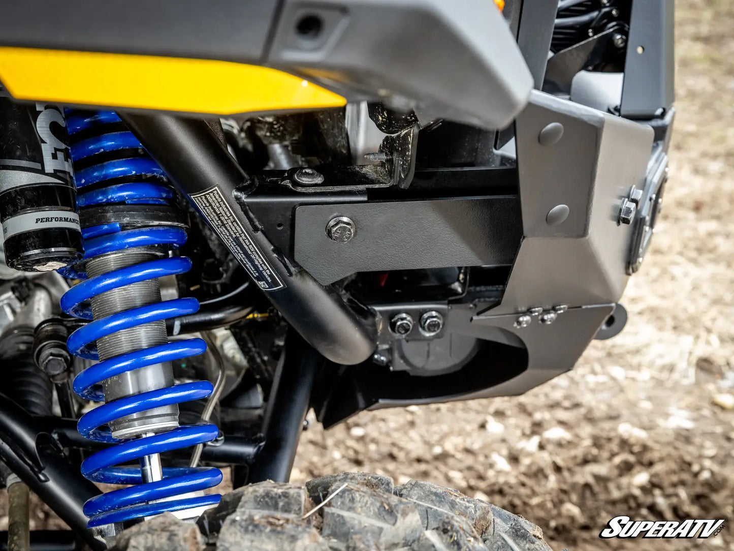 Close-up of a SuperATV suspension system on an off-road vehicle