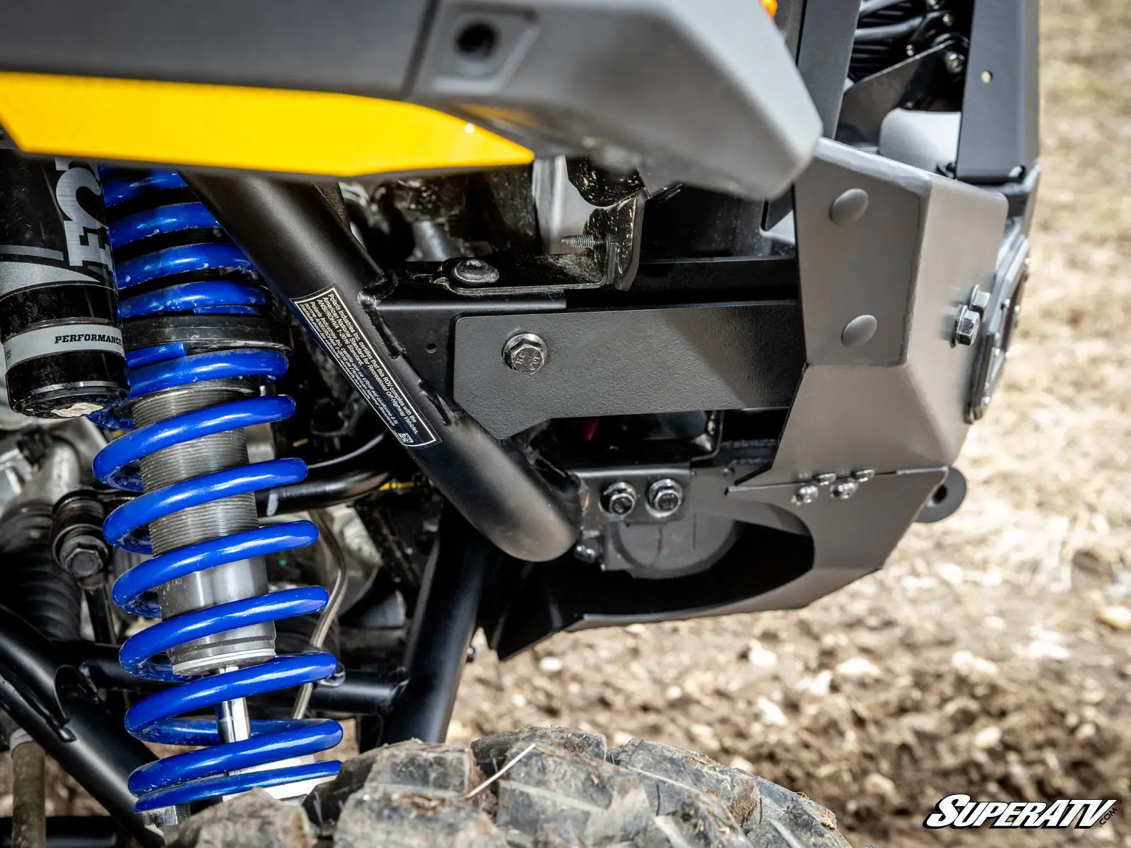 Close-up of a SuperATV suspension system on an off-road vehicle