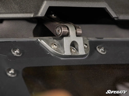 Close-up of a metal hinge on a SuperATV product
