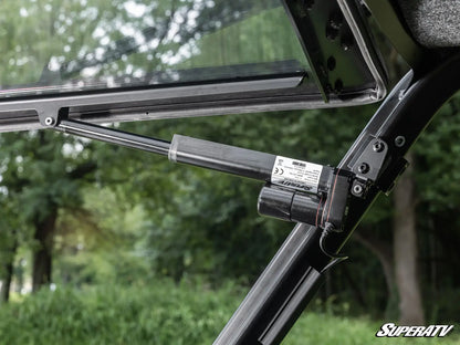 Close-up of a SuperATV product with a blurred natural background