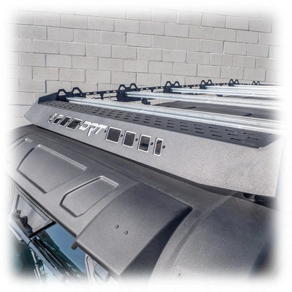 Car roof rack system on a vehicle with a tiled wall background