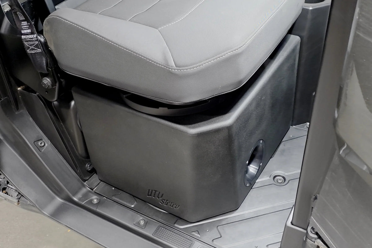 Gray car seat folded down inside a vehicle