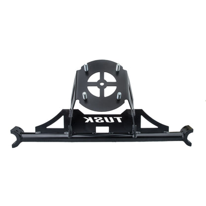 A black metal Tusk vehicle accessory with a mounting plate, four silver bolts, and a horizontal bar, shown against a plain white background.