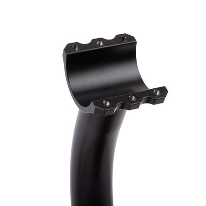 A close-up of a black bicycle headset cup and stem section on a solid white background.