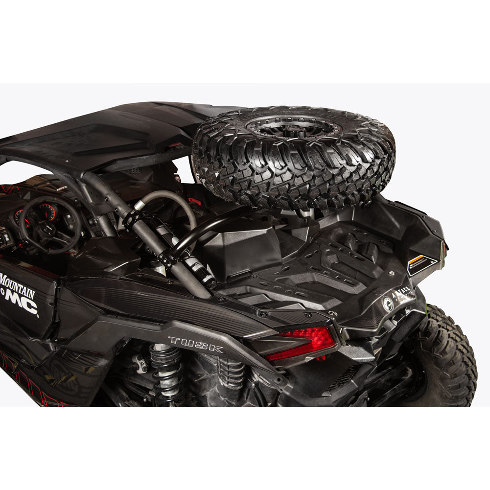 Black off-road vehicle with spare tire on a white background
