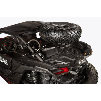 Black off-road vehicle with spare tire on a white background