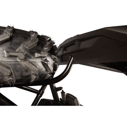 Close-up of a black all-terrain vehicle (ATV) showing the rear tire, black tubular roll bar, and side body panel against a solid white background.