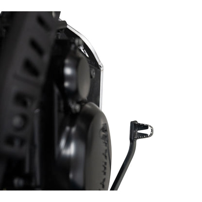 Close-up of a black motorcycle or scooter engine component with a small black metal mounting bracket attached on the right side, photographed against a plain white background.