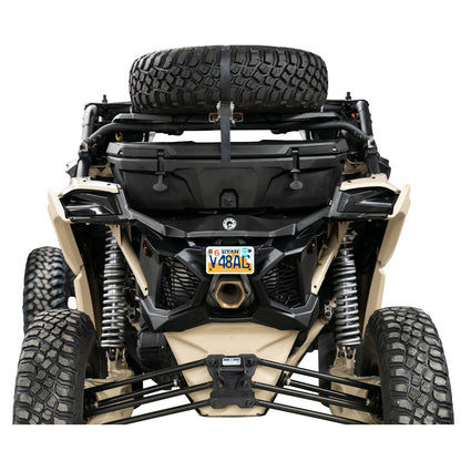 Front view of a four-wheeler with a spare tire on a white background