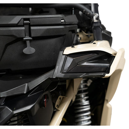 Close-up of a motorcycle's side mirror and part of the frame on a white background