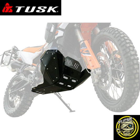 A black metal motorcycle crash bar shield shown in front of a faded orange and white off-road motorcycle on a white background, with TUSK branding at the top left and a BFE Offroad Logo at the bottom right.