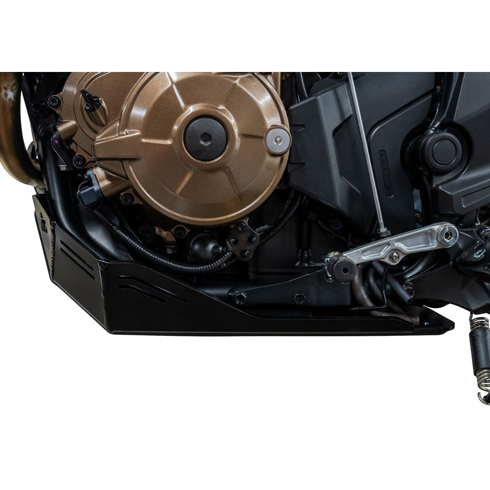 Close-up of a black engine cover and side panel on a motorcycle engine, shown against a white background.
