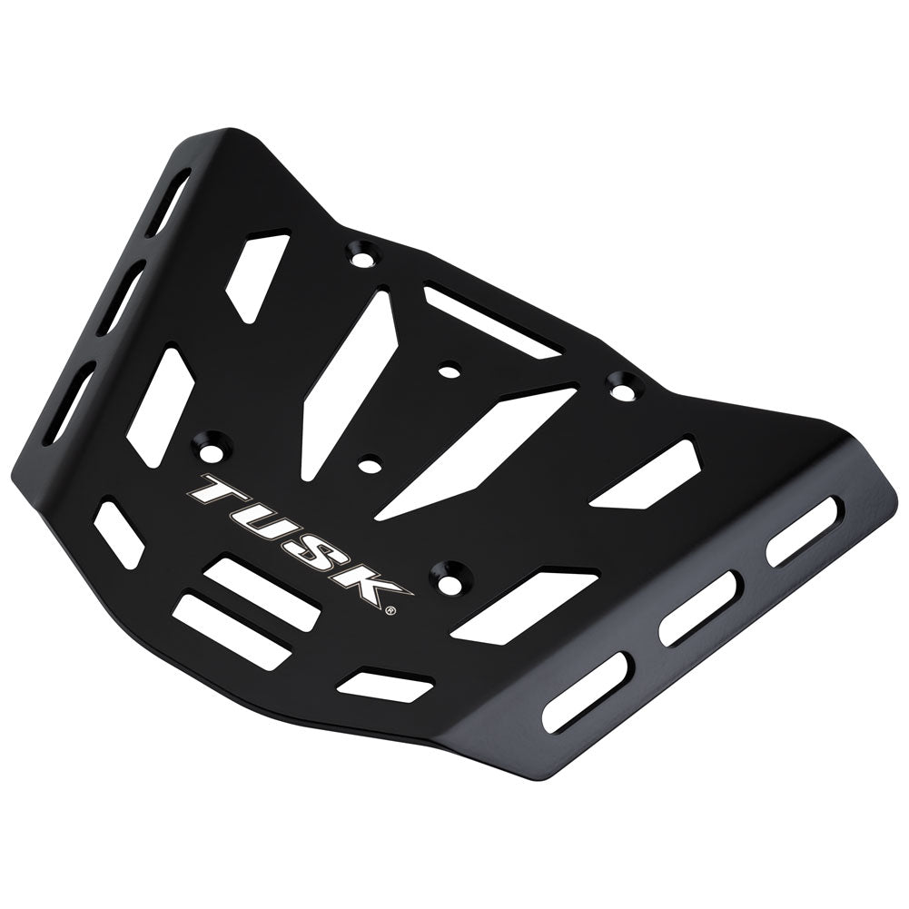 A black metal ATV front bumper guard with a cutout design and the TUSK logo printed in white on the front, shown on a plain white background.
