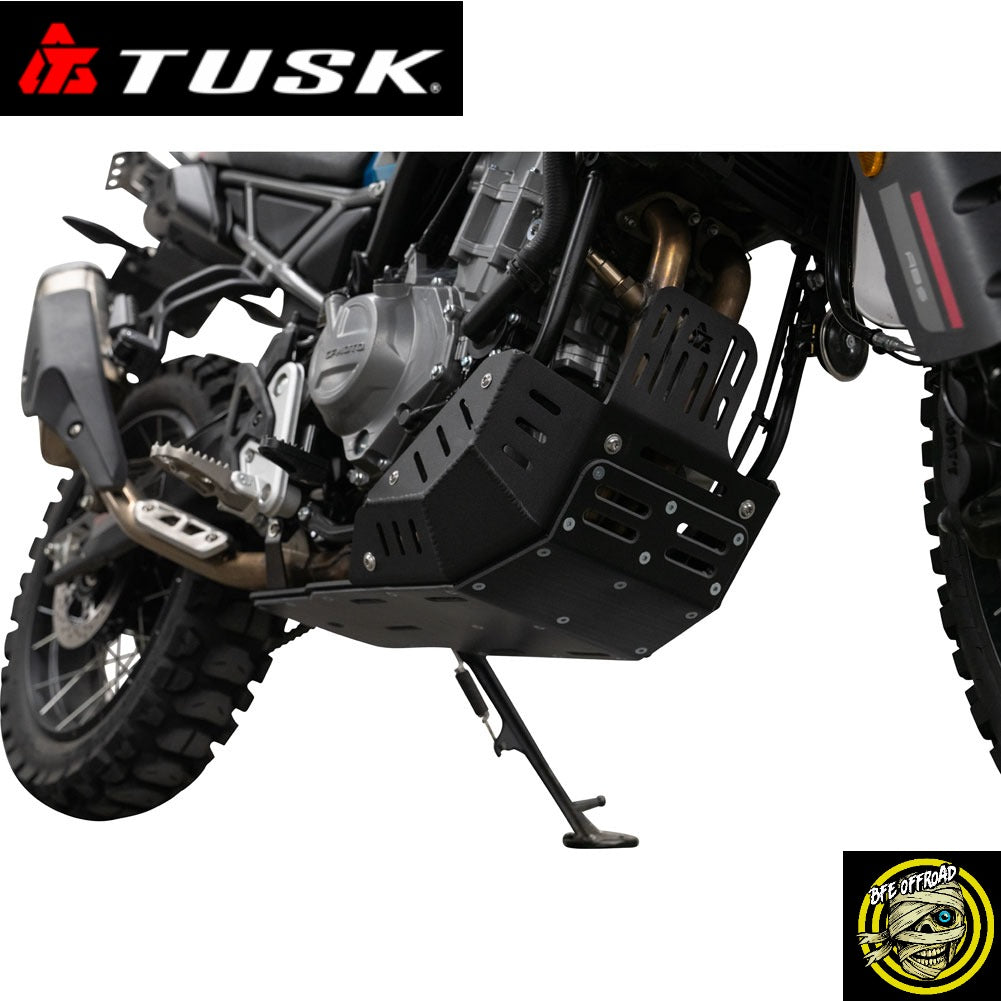 A black metal motorcycle engine guard and skid plate set shown installed on a dual-sport motorcycle, with a TUSK logo banner at the top left and a BFE Offroad logo at the bottom right.