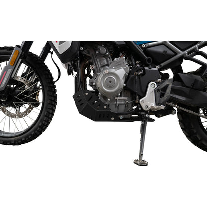 A close-up side view of a motorcycle's engine and side panel, fitted with a black metal crash bar and side shroud, shown on a white background.