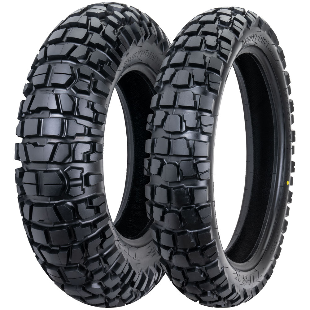 Two motorcycle tires with tread patterns on a white background