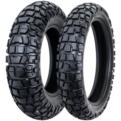 Two motorcycle tires with tread patterns on a white background