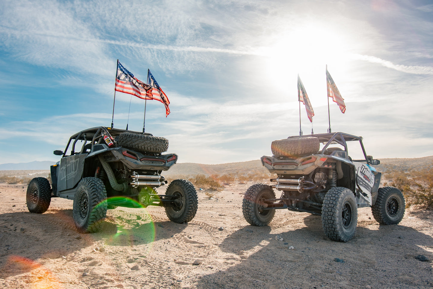 Trinity Racing Stainless Steel RZR TURBO S FULL SYSTEM on two machines in desert